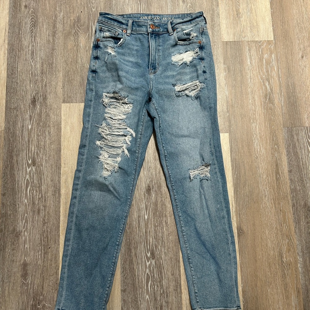 American Eagle Outfitters Heavily Distressed High-Rise Jeans in Medium Wash